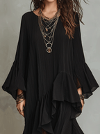 Elegante vestido midi bohemio negro asimétrico con pliegues