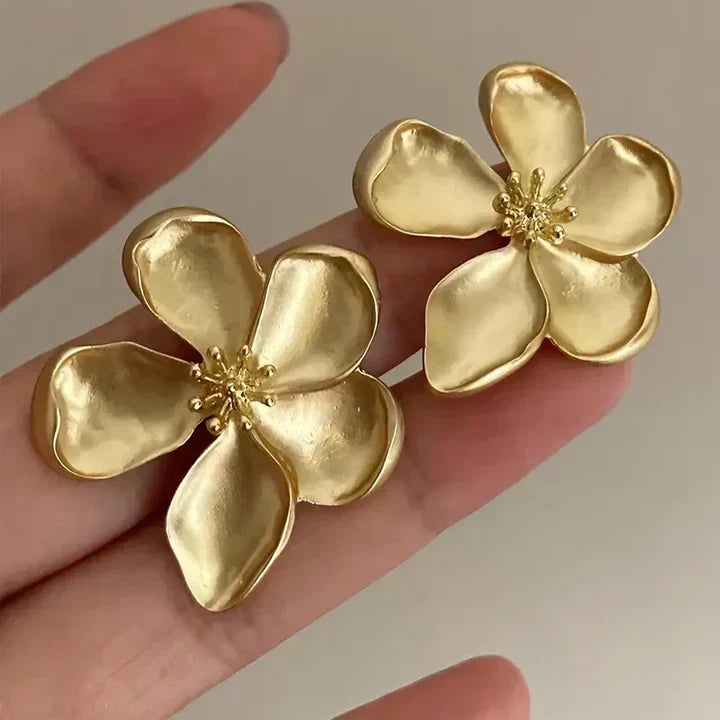 Pendientes de flores doradas