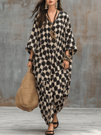 Vestido maxi caftán de inspiración bohemia con lunares y corte holgado
