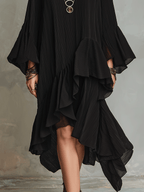 Elegante vestido midi bohemio negro asimétrico con pliegues