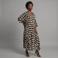 Vestido maxi caftán de inspiración bohemia con lunares y corte holgado