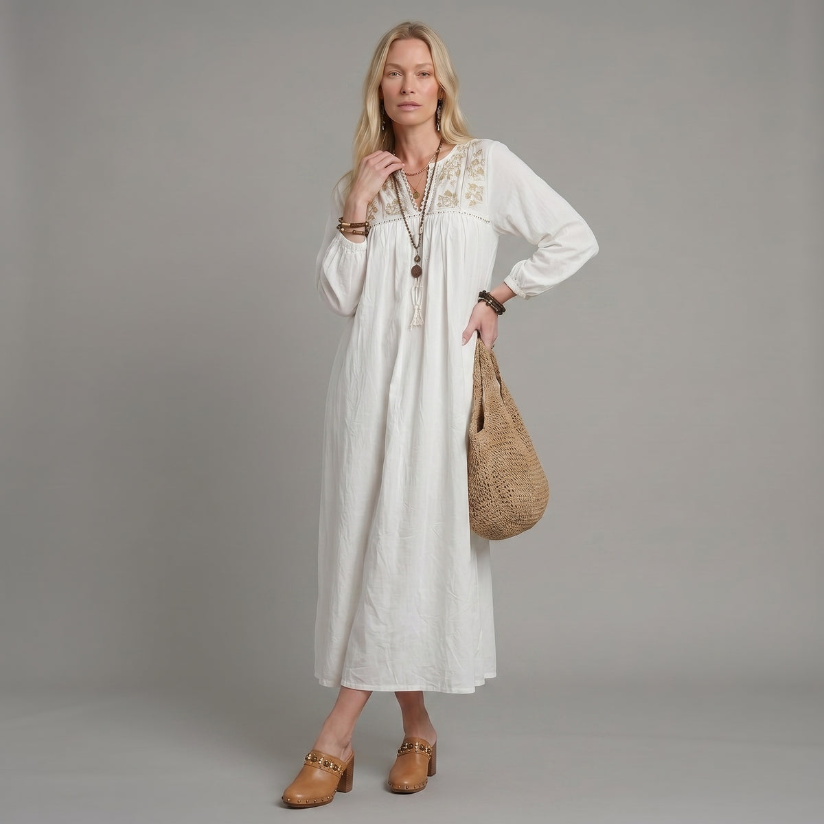 Vestido maxi blanco bohemio con bordado de flores y mangas globo
