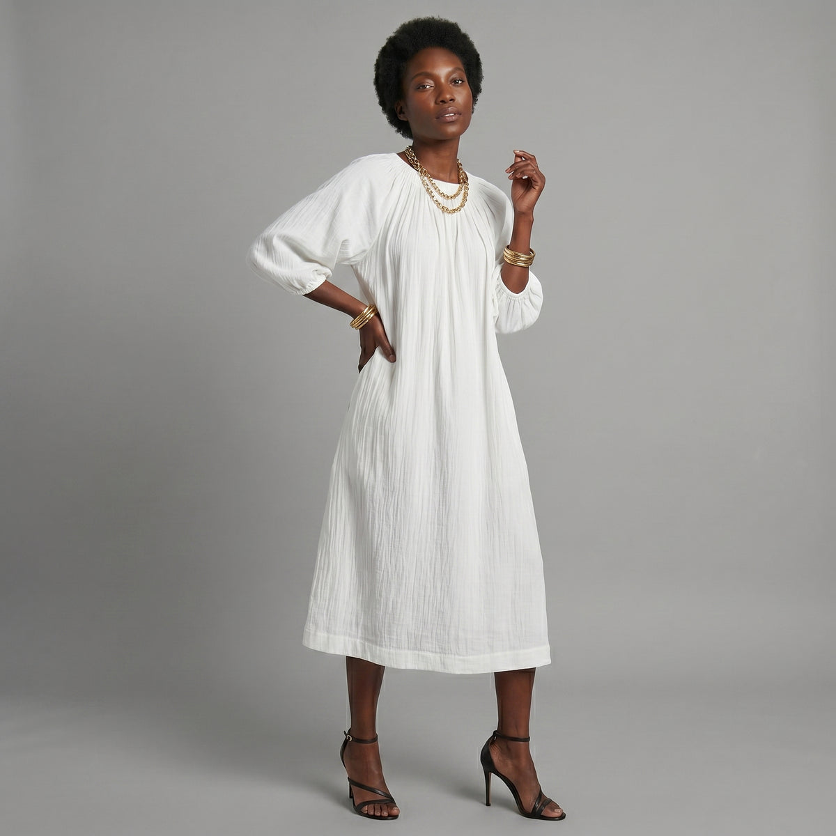 Vestido midi crema de corte relajado