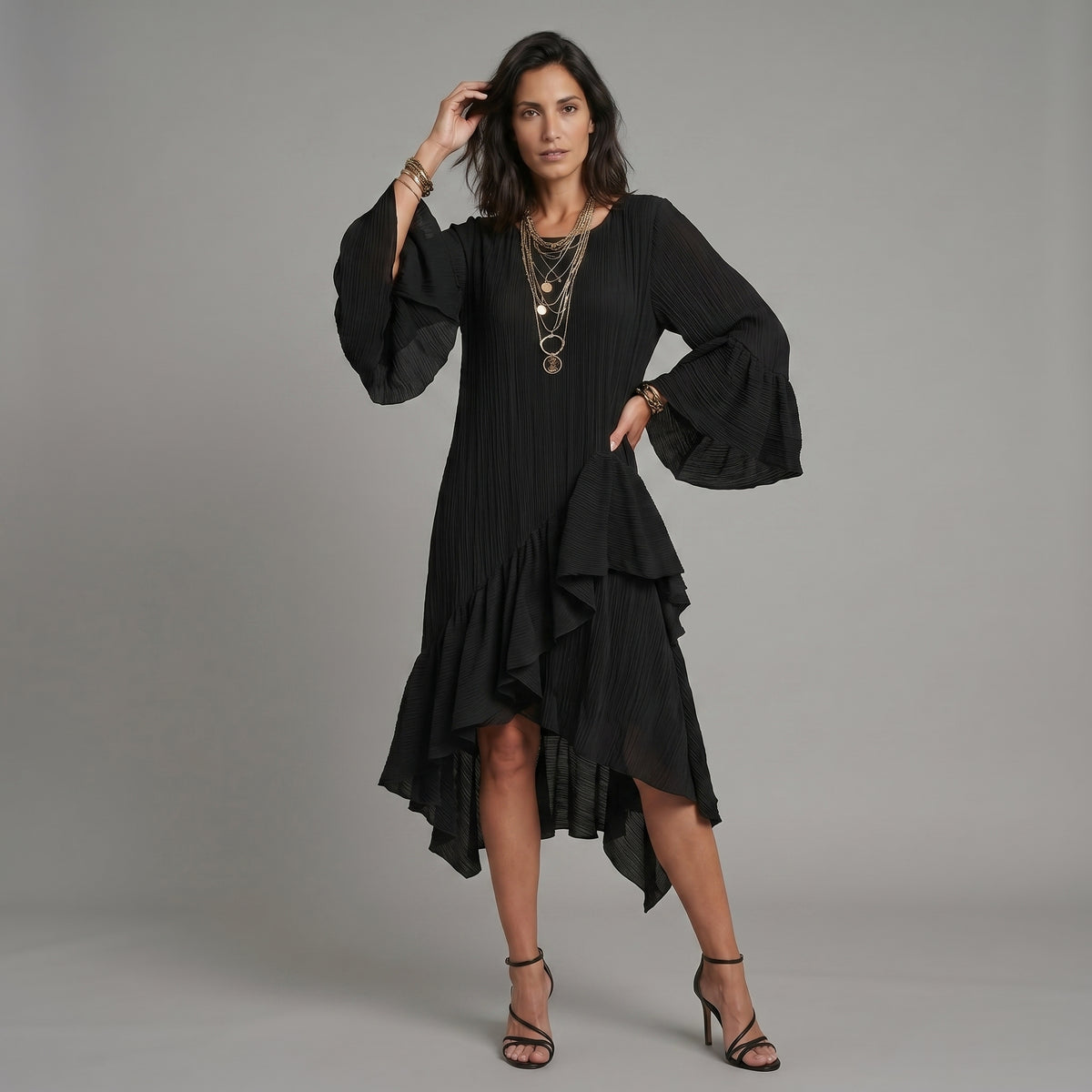 Elegante vestido midi bohemio negro asimétrico con pliegues