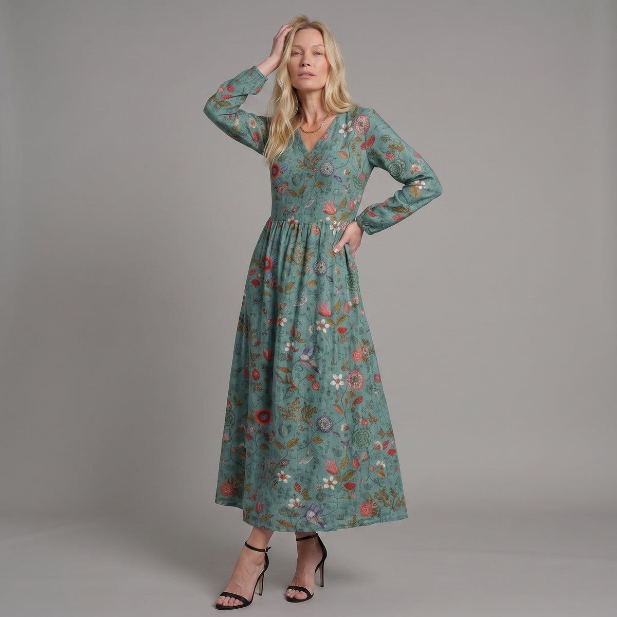 Marina™ | Vestido maxi floral con escote en V y mangas tres cuartos